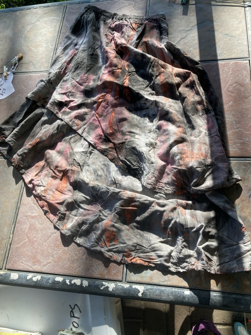 Asymmetrical Tiered Tie-Dye Midi Skirt in Black with Rust & Pink Accents